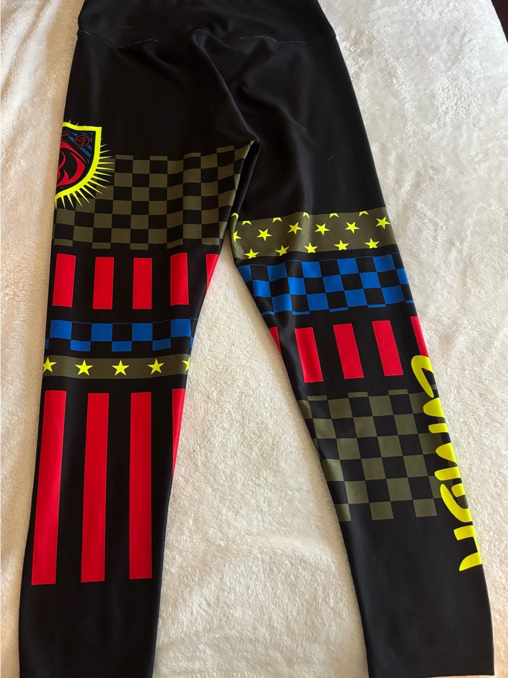 Zumba Fitness Black Leggings with Neon Yellow, Red & Blue Graphic Panels - Picture 2 of 3